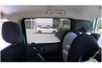 Interior view of a Ford Ranger 3rd Generation showcasing Snap Shades rear window sunshades installed for UV protection and privacy.