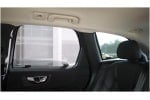 Volvo XC60 rear seat area featuring Snap Shades installed on the side and port windows.